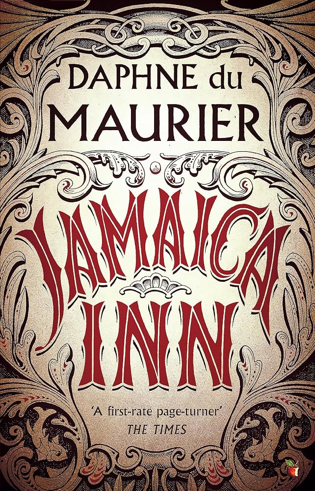 Book cover of 'Jamaica Inn' by Daphne du Maurier featuring ornate designs and bold red typography.